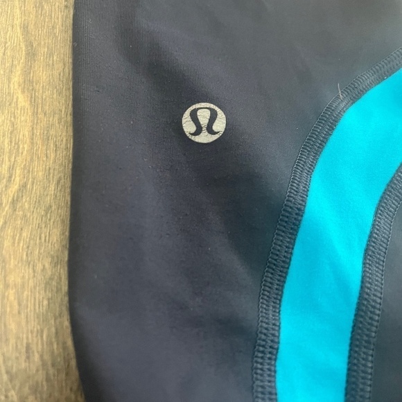 Lululemon Navy with Blue Band and back Pocket Crop Leggings - Picture 7 of 7